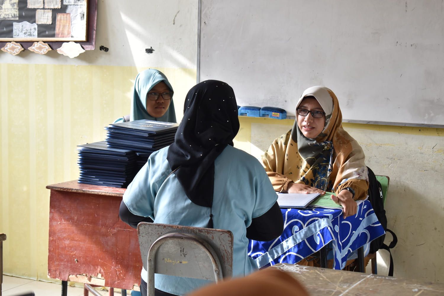 Penyerahan Rapor Semester Ganjil Tahun Ajaran 2025/2026 di SMKN 6 Pekanbaru