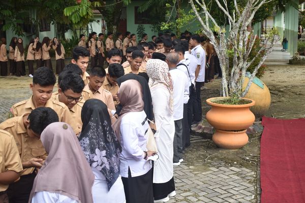 Merajut Kebersamaan dalam Nuansa Syawal: Halal Bi Halal Keluarga Besar SMKN 6 Pekanbaru